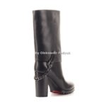 Tall women’s autumn winter boots above the knee. They are standing in the studio on a white background. Boots with zippers. Color is blue. The material is leather